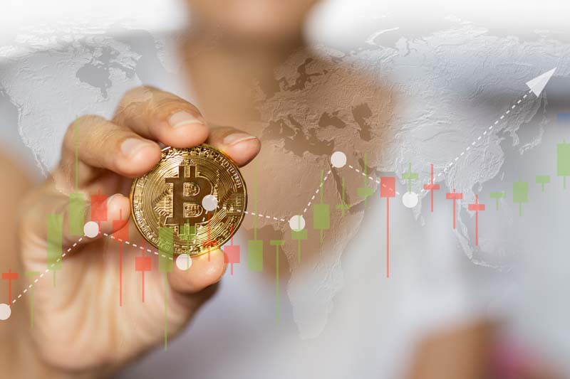 عکس بیت کوین پشت نمودار