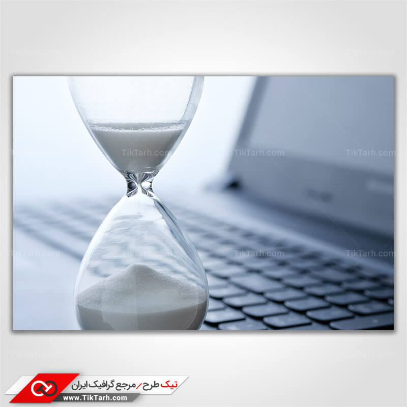 دانلود عکس با کیفیت ساعت شنی و لپ تاپ