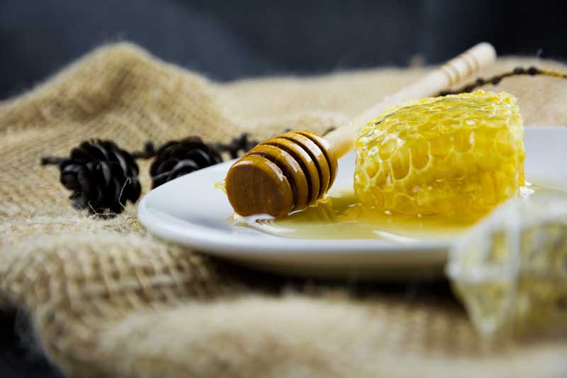 دانلود عکس یک ظرف عسل زرد