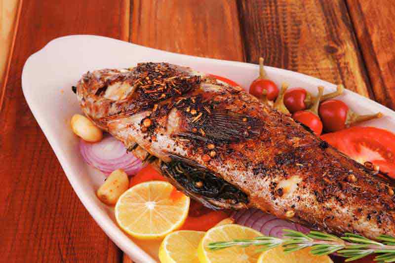 عکس با کیفیت از ماهی با لیمو