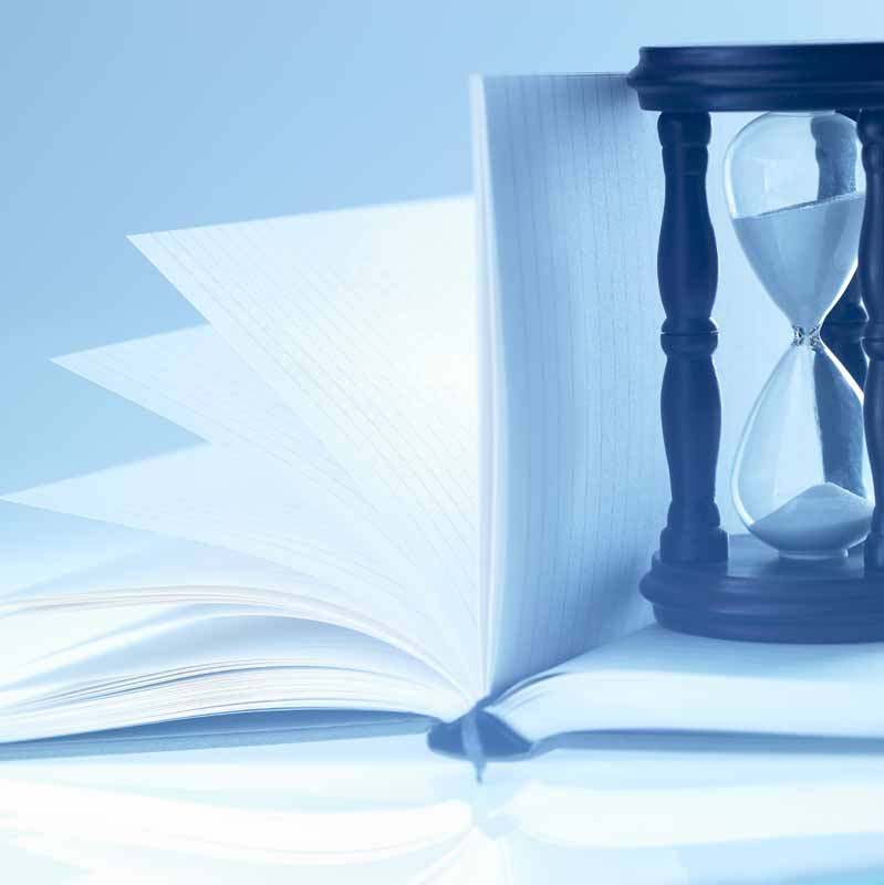 تصویر لارج فرمت از کتاب و ساعت شنی