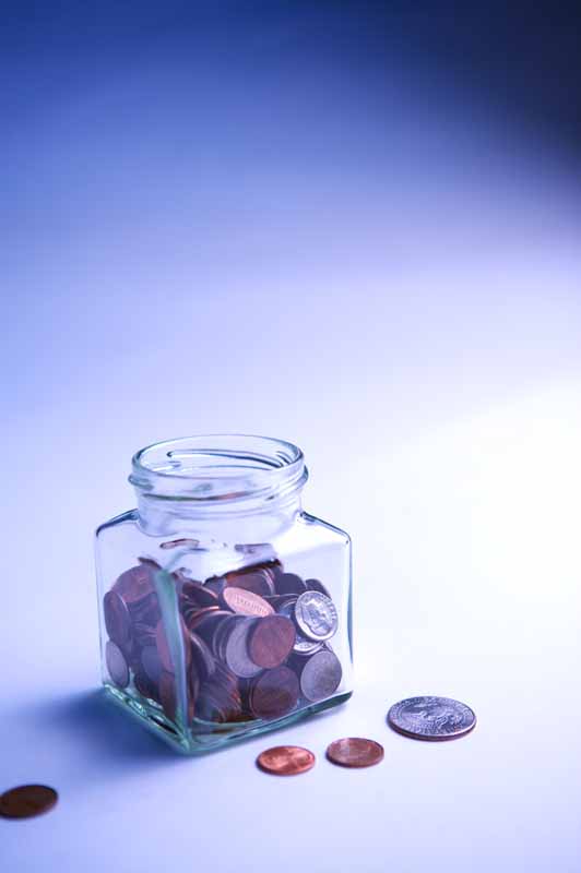 عکس با کیفیت از سکه ها در شیشه