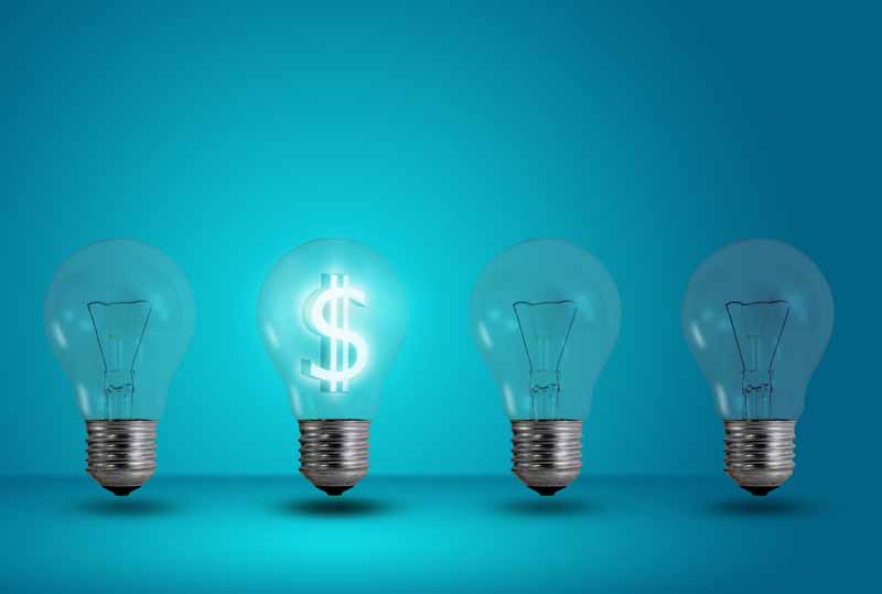 عکس با کیفیت از نماد دلار در لامپ