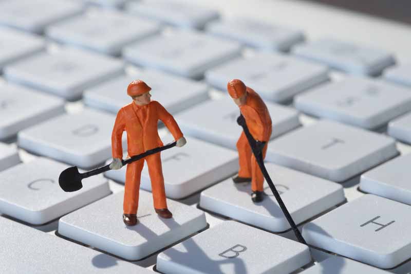 تصویر با کیفیت کارگران روی کیبورد